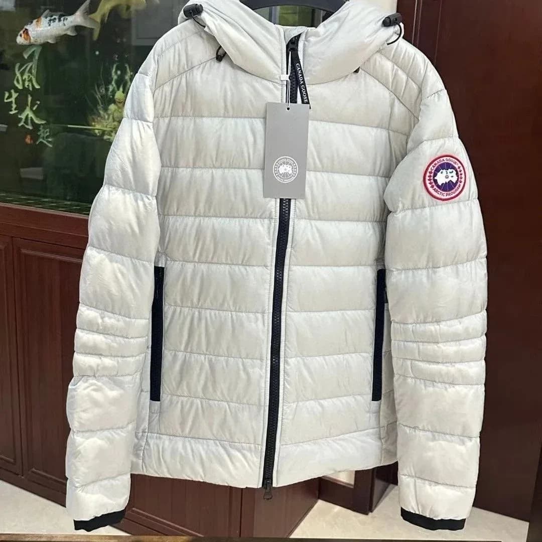 Canada Goose Arctic Program White Jacket with Red Sleeve Patch — product photo on Sugargoo Spreadsheet