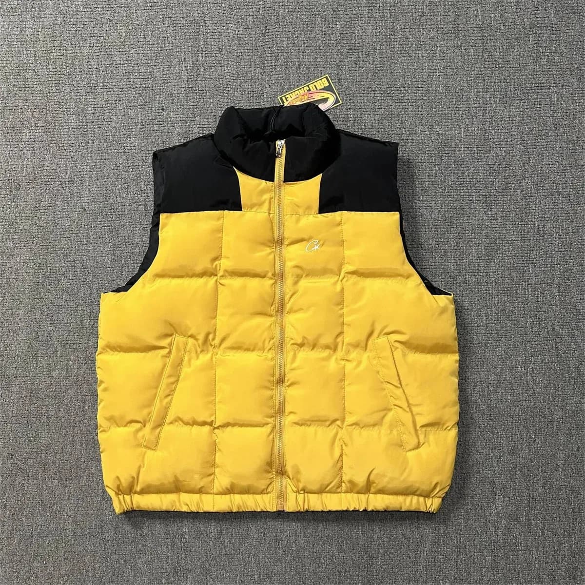 Corteiz Unisex Yellow & Black Puffer Vest — product photo on Sugargoo Spreadsheet