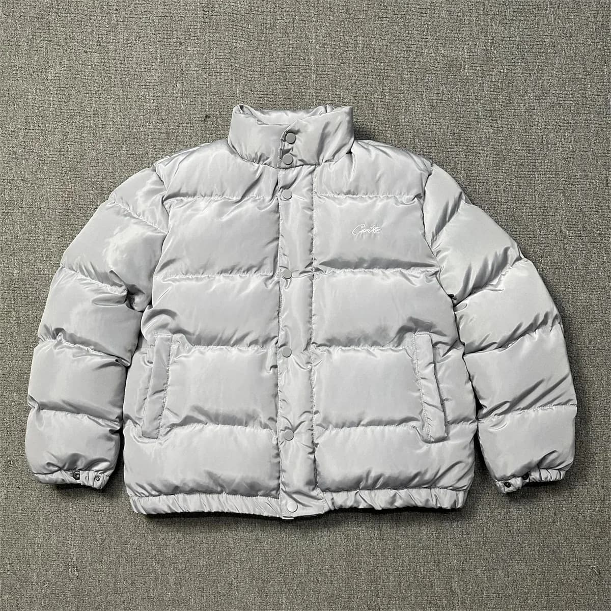 Corteiz Light Grey Puffer Jacket with Embroidered Logo — QC product photo on Sugargoo Spreadsheet