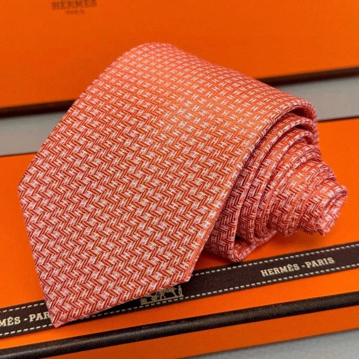 Hermès Orange Herringbone Silk Tie — product photo on Sugargoo Spreadsheet