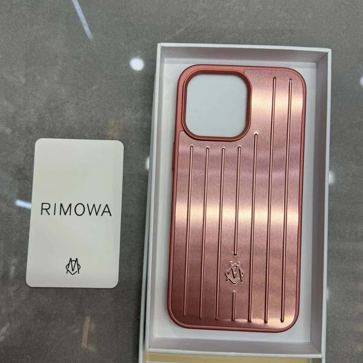 Rimowa Pink Aluminum Phone Case — product photo on Sugargoo Spreadsheet