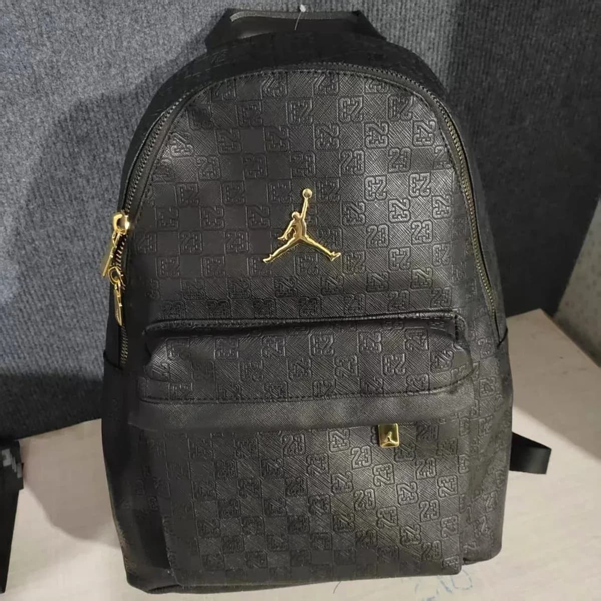 Jordan Air Jordan Pu Black Gold Backpack — product photo on Sugargoo Spreadsheet